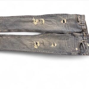 Distressed blue Jeans